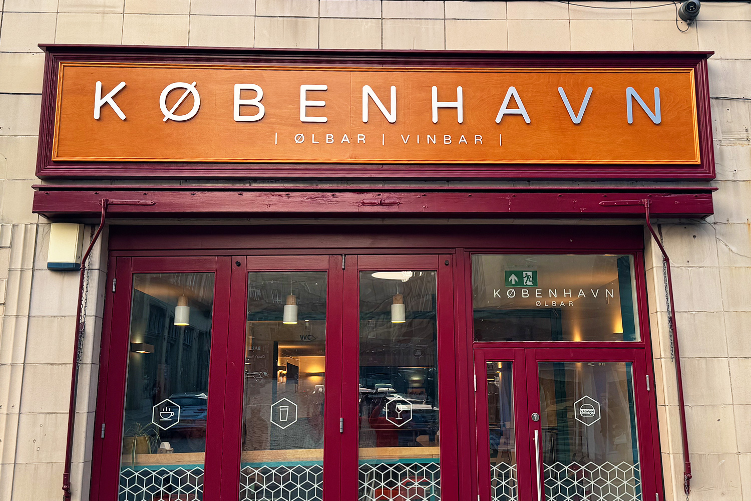 København bar exterior signage with modern wooden fascia and bold Scandinavian lettering in Halifax