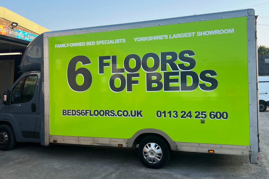 Luton van graphics for 6 Floors of Beds featuring bold branding, product imagery, and contact information on all sides